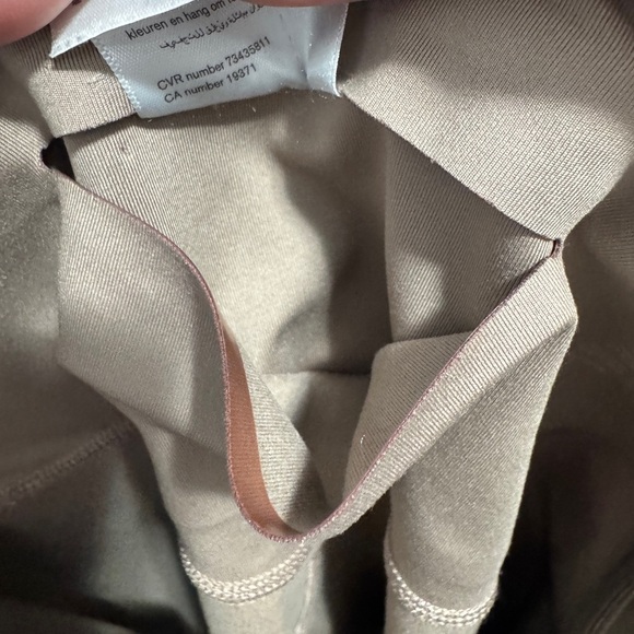 Girlfriend Collective High Waisted Biker Shorts Tan - Picture 6 of 9